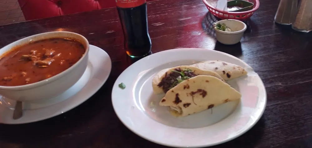 Large Menudo Plate and Barbacoa Taco Plate
